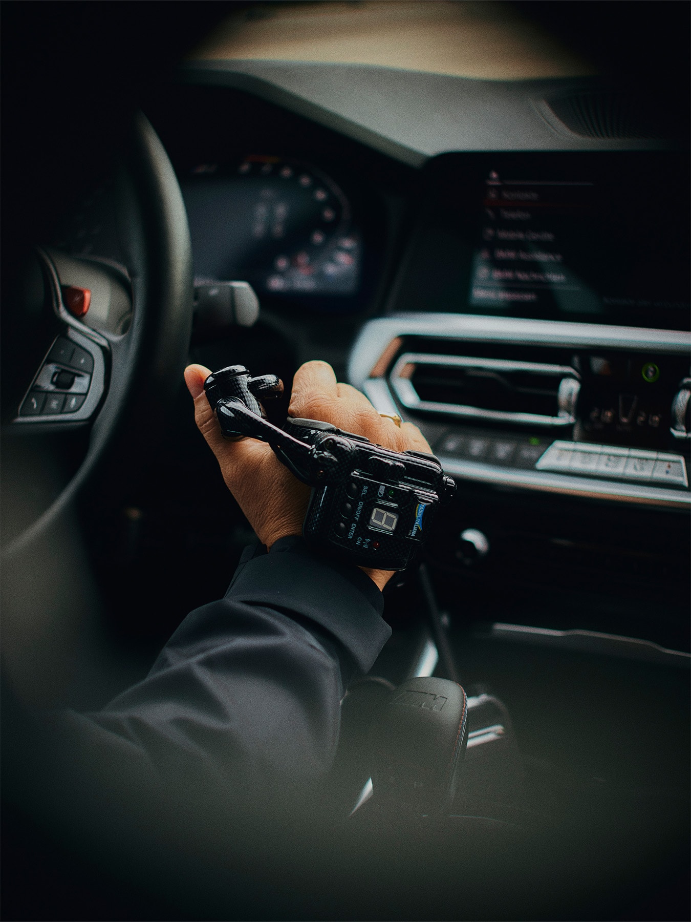 Acceleration and braking are achieved using hand controls in the specially adapted cars of the BMW M Driving Academy.