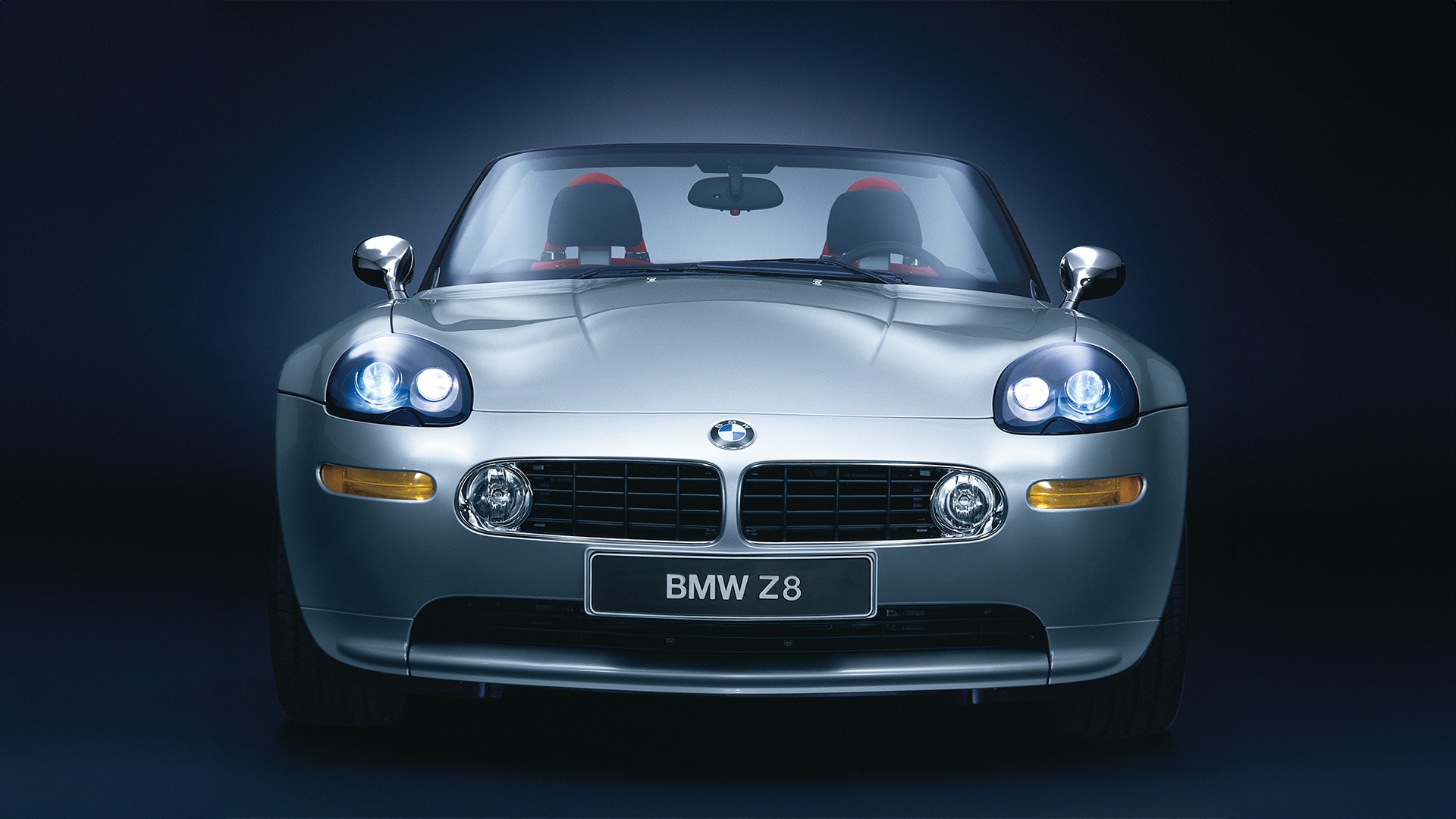 2000: The BMW Z8 was the first to use dynamic integration of the headlamps into the body. The headlamp housing merged seamlessly with the mudguards.&nbsp;Swivelling projection modules dynamically adapted the light distribution to the direction of travel, thereby improving visibility through bends.