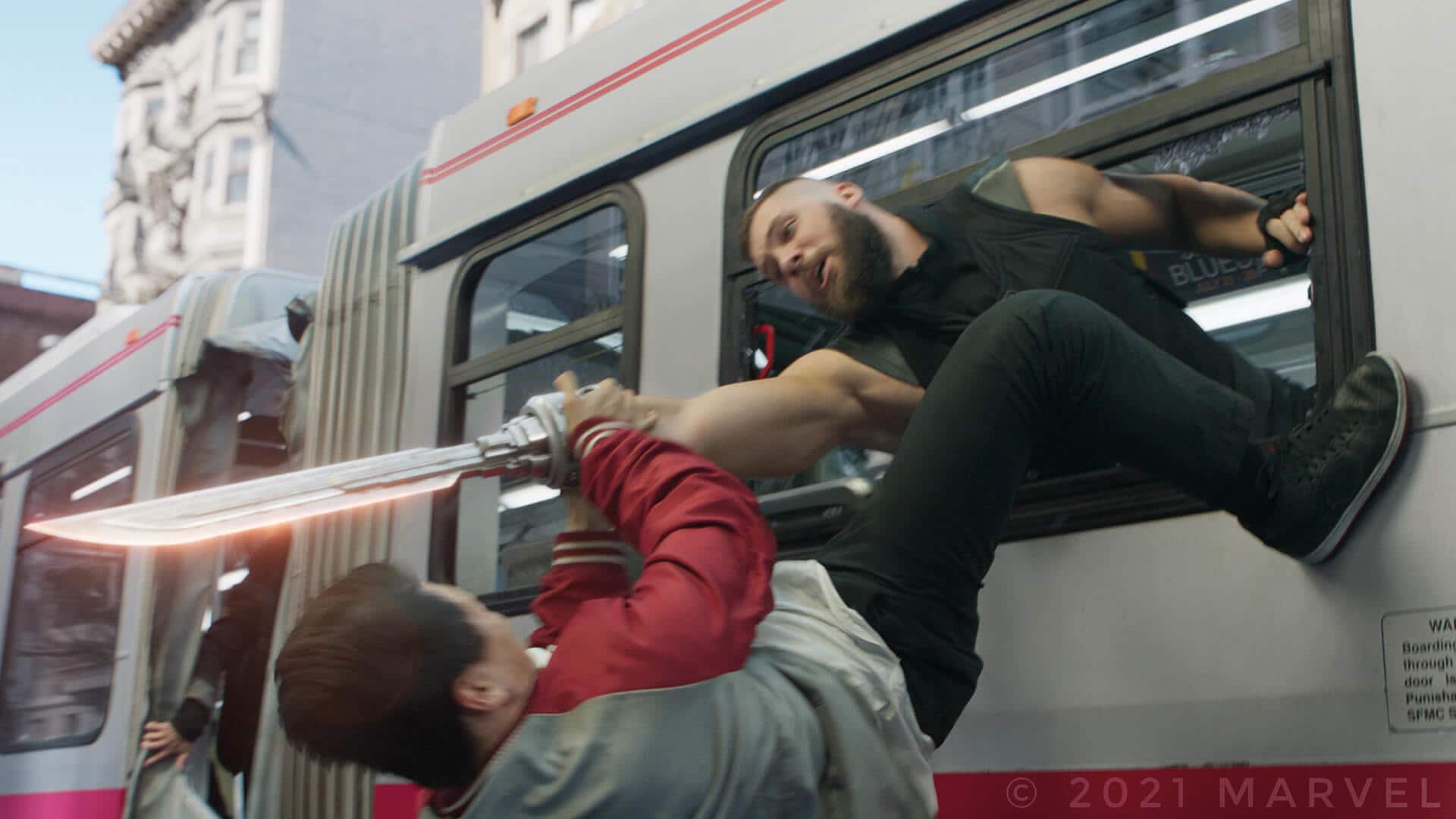 Two striking figures: Florian Munteanu as Razor Fist and his BMW iX3 in action.