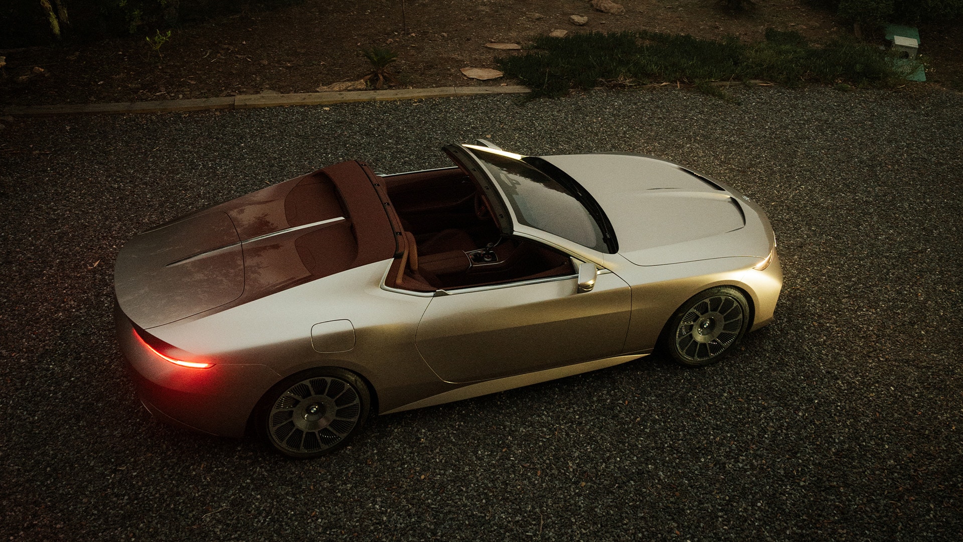 The timelessly elegant design features a striking bar from the bonnet to an aluminium strip on the tailgate with discreet winglets in the door sills replacing traditional handles.